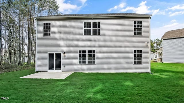 1010 Ocean Ct, Carthage, NC 28327 - back of property with a lawn and a patio area