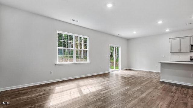 1010 Ocean Ct, Carthage, NC 28327 - unfurnished living room with dark wood finished floors and recessed lighting