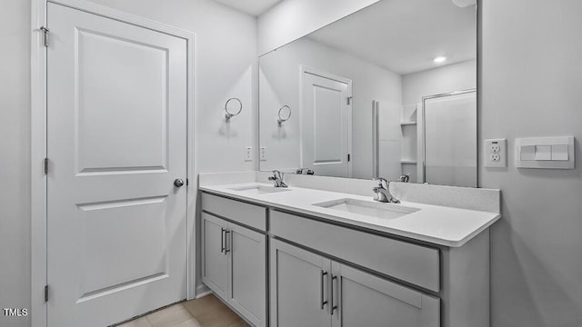 1010 Ocean Ct, Carthage, NC 28327 - bathroom featuring double vanity and tile patterned flooring