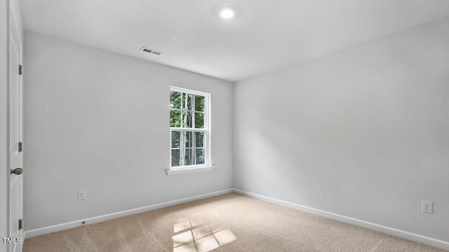 1010 Ocean Ct, Carthage, NC 28327 - unfurnished room featuring baseboards and light carpet