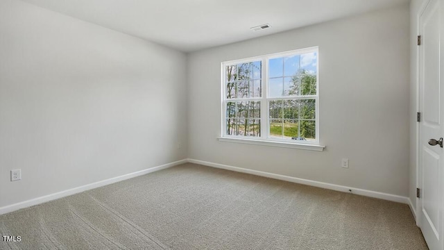 1010 Ocean Ct, Carthage, NC 28327 - carpeted empty room with baseboards