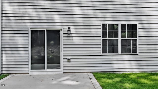 1010 Ocean Ct, Carthage, NC 28327 - view of side of home with a patio area