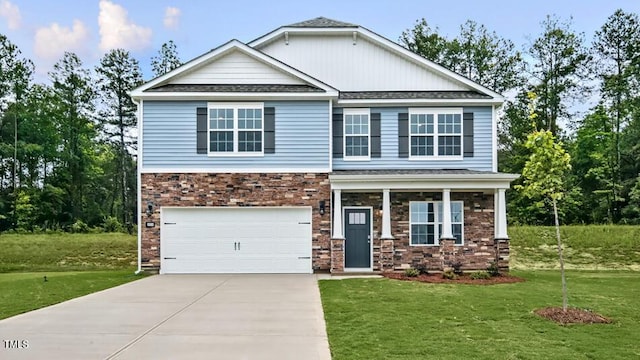 1014 Ocean Ct, Carthage, NC 28327 - craftsman-style house with driveway, a front lawn, a garage, and a shingled roof