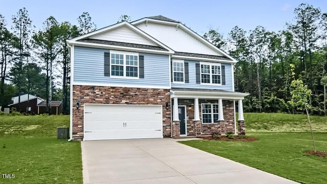 1014 Ocean Ct, Carthage, NC 28327 - craftsman inspired home featuring driveway, an attached garage, a front yard, and covered porch