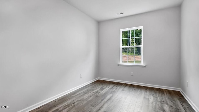 1014 Ocean Ct, Carthage, NC 28327 - unfurnished room featuring dark wood-style flooring and baseboards