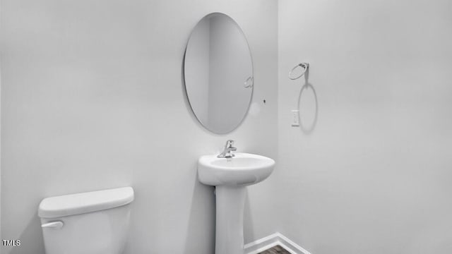 1014 Ocean Ct, Carthage, NC 28327 - half bathroom featuring toilet and a sink
