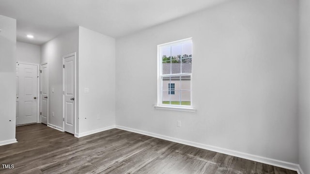 1014 Ocean Ct, Carthage, NC 28327 - unfurnished room with dark wood-style flooring