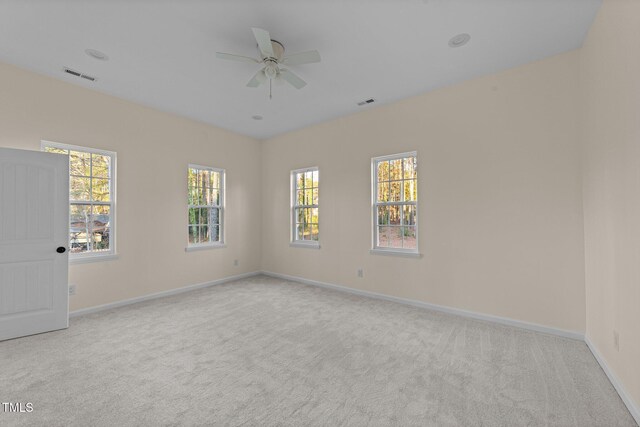 612 Lakeview Dr, Raleigh, NC 27603 - spare room featuring carpet flooring, baseboards, and a ceiling fan