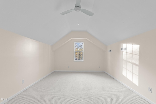 612 Lakeview Dr, Raleigh, NC 27603 - bonus room featuring light colored carpet, lofted ceiling, baseboards, and a ceiling fan