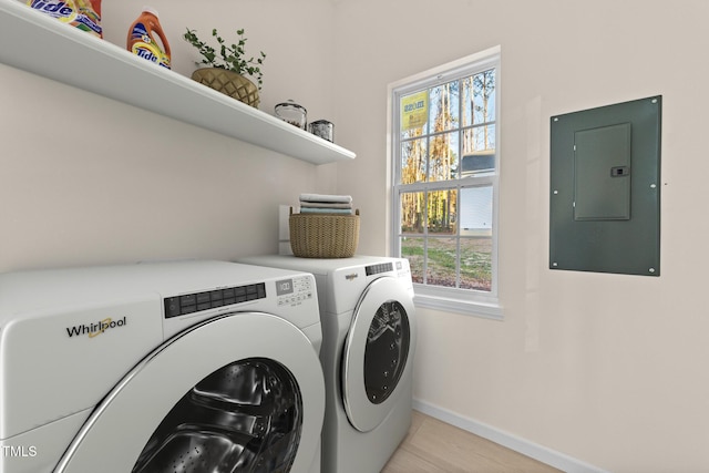 612 Lakeview Dr, Raleigh, NC 27603 - washroom with electric panel, separate washer and dryer, healthy amount of natural light, and baseboards
