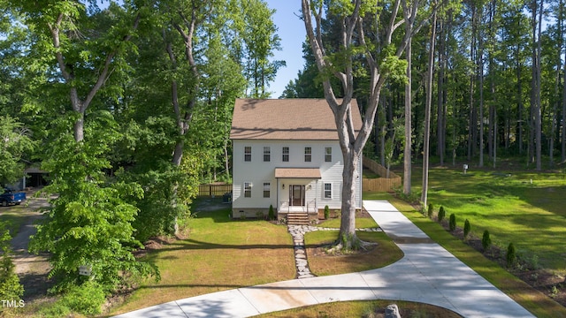 612 Lakeview Dr, Raleigh, NC 27603 - view of front of home with a front yard and roof with shingles