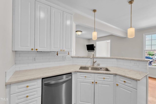 11035 Southwalk Ln, Raleigh, NC 27614 - kitchen with dishwasher, a sink, backsplash, white cabinetry, and a peninsula