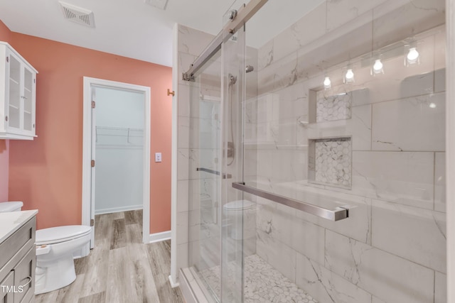11035 Southwalk Ln, Raleigh, NC 27614 - full bathroom with toilet, vanity, and a marble finish shower