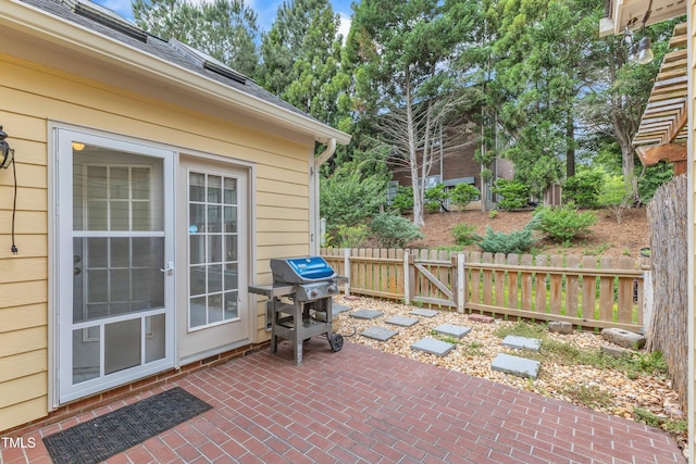 11035 Southwalk Ln, Raleigh, NC 27614 - view of patio featuring grilling area and fence