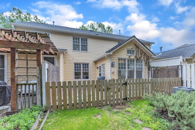 11035 Southwalk Ln, Raleigh, NC 27614 - rear view of property with fence, a pergola, and central AC