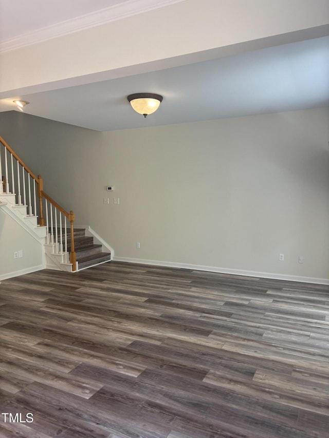 11035 Southwalk Ln, Raleigh, NC 27614 - unfurnished living room with crown molding, stairway, and dark wood finished floors