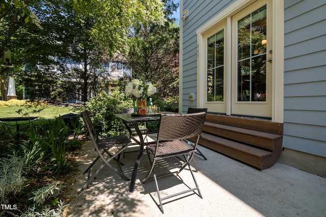 view of patio with outdoor dining space
