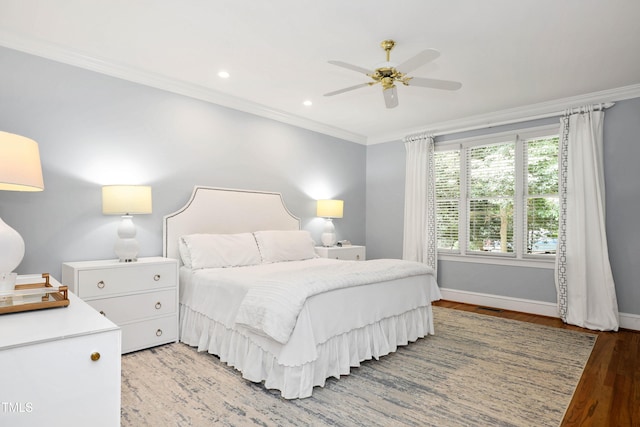 bedroom with baseboards, recessed lighting, ceiling fan, ornamental molding, and light wood-type flooring