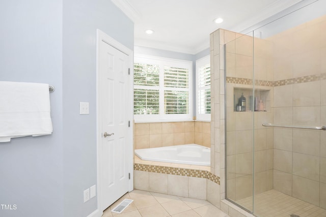 full bath featuring visible vents, a garden tub, a stall shower, crown molding, and tile patterned flooring
