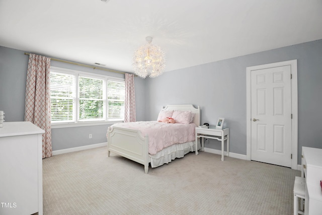 bedroom featuring an inviting chandelier, light colored carpet, baseboards, and visible vents