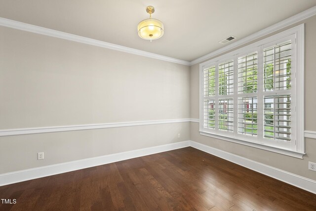 10529 Sablewood Dr Unit 111, Raleigh, NC 27617 - spare room featuring dark wood finished floors, crown molding, and baseboards