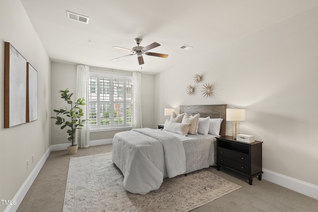 10529 Sablewood Dr Unit 111, Raleigh, NC 27617 - bedroom with carpet, baseboards, and a ceiling fan