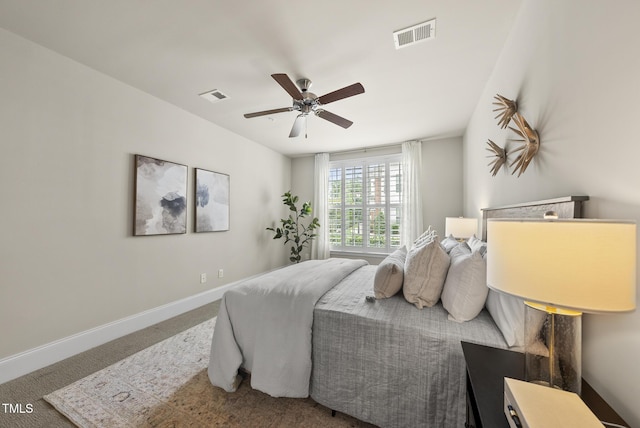 10529 Sablewood Dr Unit 111, Raleigh, NC 27617 - carpeted bedroom featuring baseboards and ceiling fan