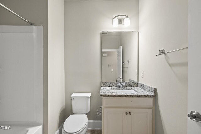 10529 Sablewood Dr Unit 111, Raleigh, NC 27617 - full bath featuring toilet, a shower, vanity, baseboards, and a tub to relax in