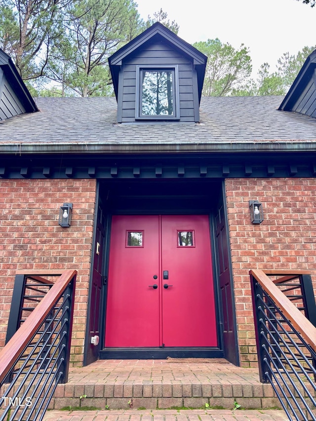 917 Queensferry Rd, Cary, NC 27511 - property entrance featuring brick siding and roof with shingles