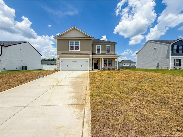 2224 Roadster Pony Rd, Hope Mills, NC 28348 - view of front of home featuring concrete driveway, an attached garage, and covered porch