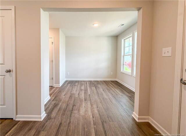 2224 Roadster Pony Rd, Hope Mills, NC 28348 - spare room with dark wood finished floors