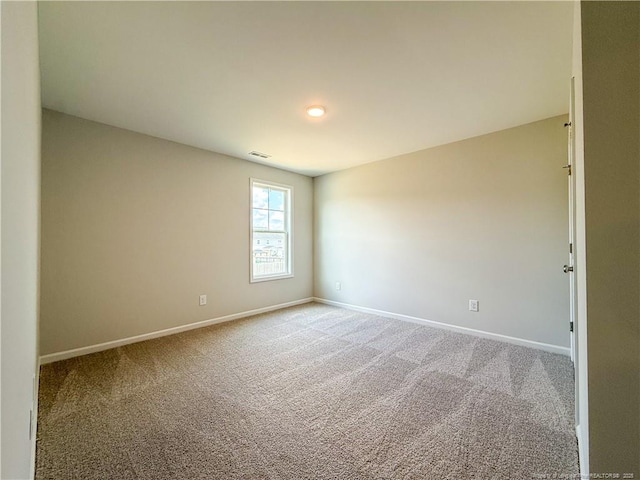 2224 Roadster Pony Rd, Hope Mills, NC 28348 - carpeted spare room with baseboards