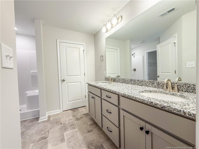 2224 Roadster Pony Rd, Hope Mills, NC 28348 - bathroom featuring double vanity and a shower