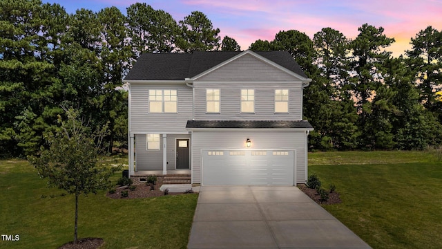 20 Diamond Creek Dr, Zebulon, NC 27597 - traditional-style house with concrete driveway, a garage, and a front lawn