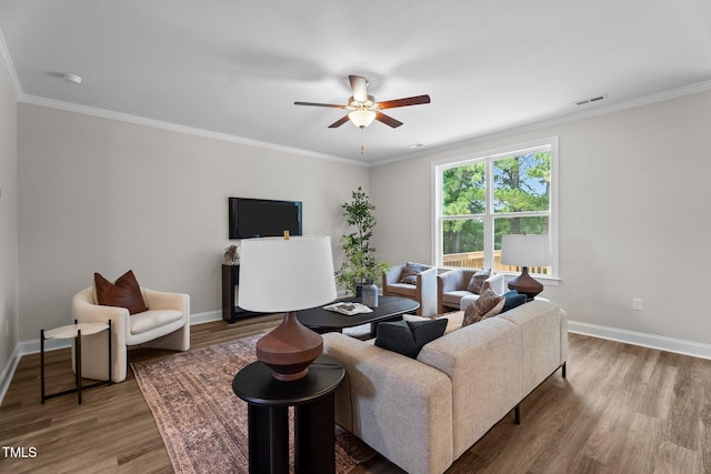 20 Diamond Creek Dr, Zebulon, NC 27597 - living area with a ceiling fan, wood finished floors, and ornamental molding