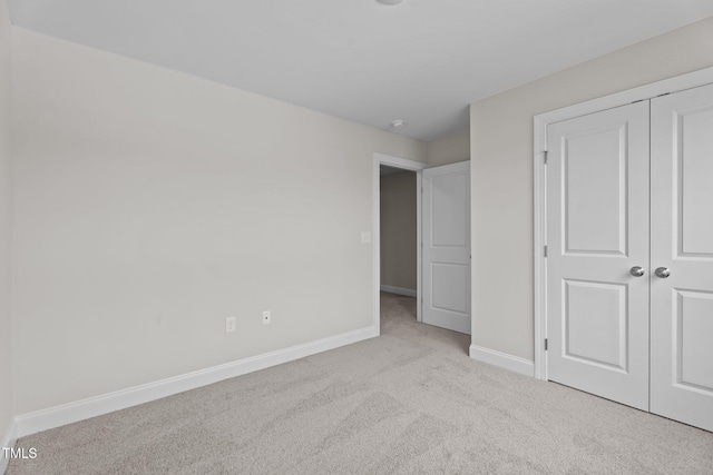 20 Diamond Creek Dr, Zebulon, NC 27597 - unfurnished bedroom featuring carpet and a closet