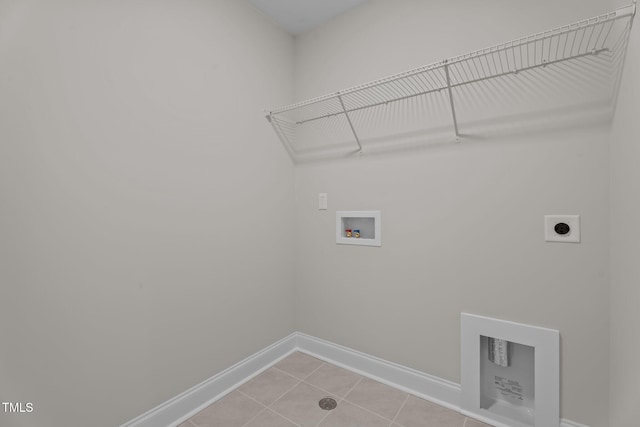 20 Diamond Creek Dr, Zebulon, NC 27597 - washroom with electric dryer hookup, washer hookup, and light tile patterned floors