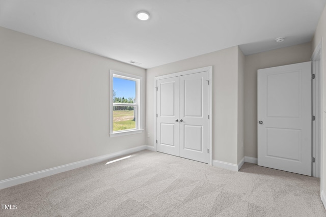 20 Diamond Creek Dr, Zebulon, NC 27597 - unfurnished bedroom with carpet flooring and a closet