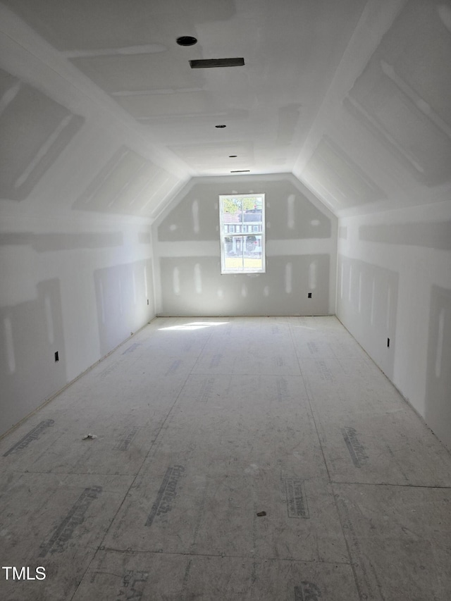bonus room with vaulted ceiling