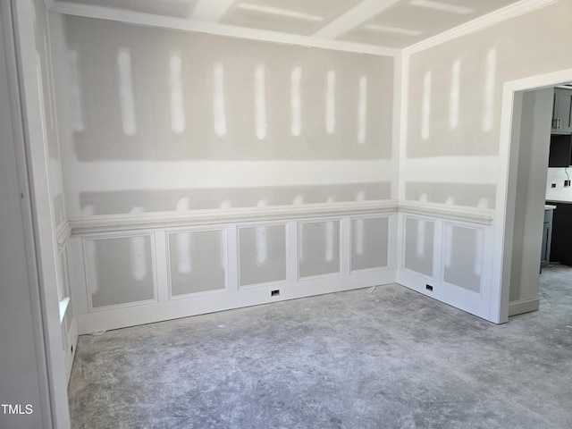 unfurnished room featuring crown molding