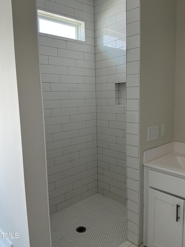 1039 N Lincoln St, Benson, NC 27504 - bathroom with a tile shower and vanity