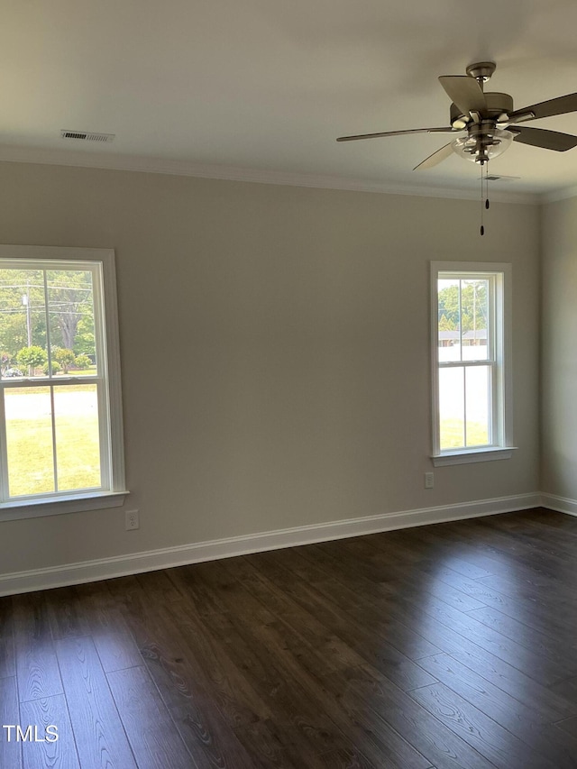 1039 N Lincoln St, Benson, NC 27504 - empty room with ornamental molding, dark wood-style floors, and ceiling fan