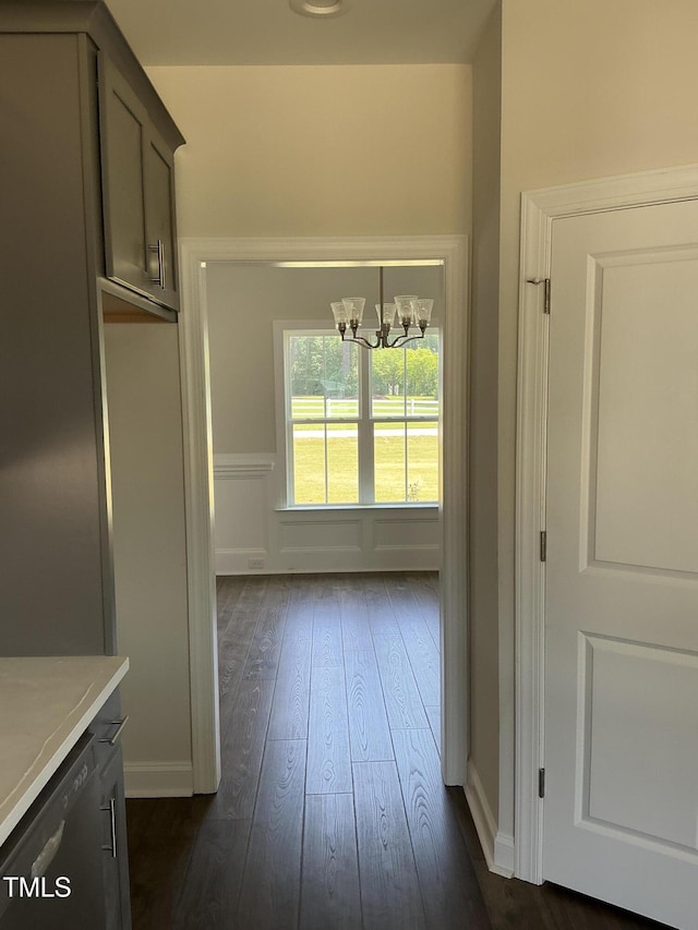1039 N Lincoln St, Benson, NC 27504 - unfurnished dining area featuring a chandelier and dark wood-style flooring