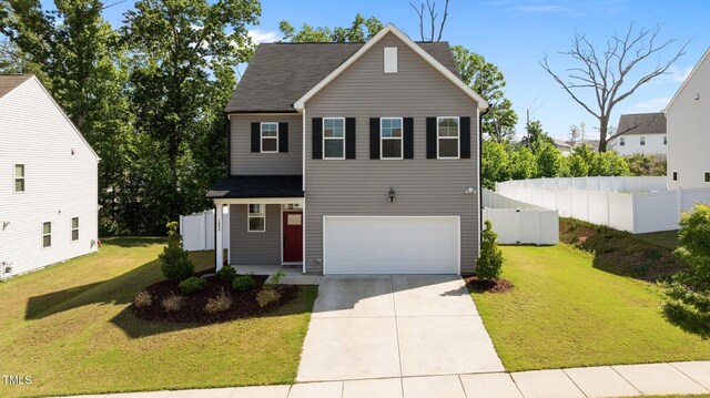 1028 Gallivant Way, Wake Forest, NC 27587 - traditional home with an attached garage, concrete driveway, and roof with shingles