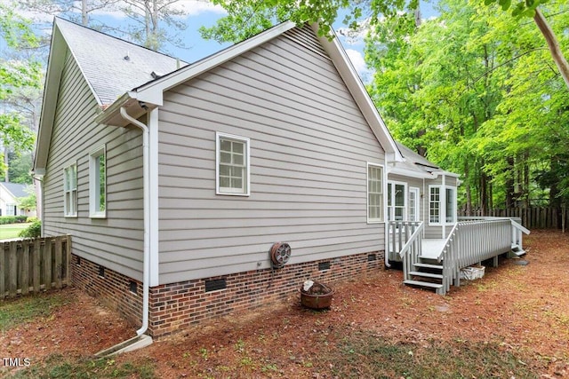 5 Wembley Ct, Durham, NC 27705 - back of property featuring crawl space, a wooden deck, and fence