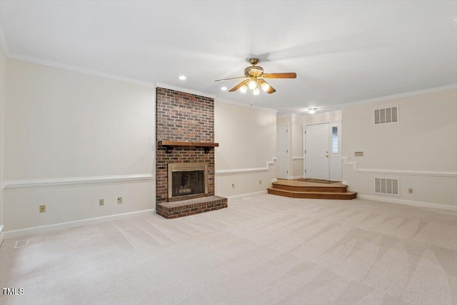 5 Wembley Ct, Durham, NC 27705 - unfurnished living room with ornamental molding, a ceiling fan, carpet, baseboards, and a brick fireplace