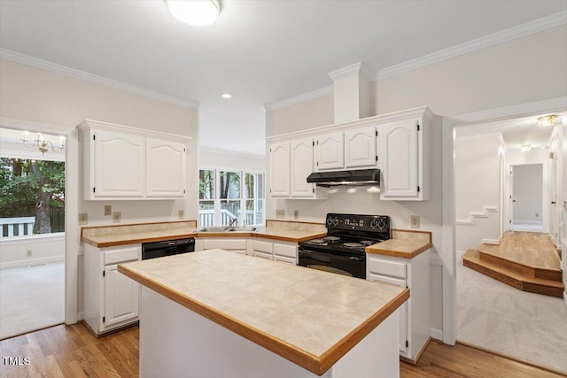 5 Wembley Ct, Durham, NC 27705 - kitchen featuring black appliances, white cabinetry, a sink, under cabinet range hood, and crown molding