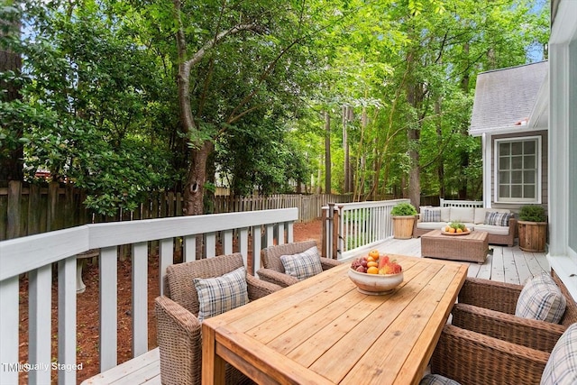 5 Wembley Ct, Durham, NC 27705 - wooden deck featuring outdoor lounge area, a fenced backyard, and outdoor dining space