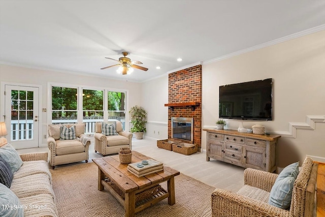 5 Wembley Ct, Durham, NC 27705 - living area with crown molding, ceiling fan, a fireplace, and recessed lighting