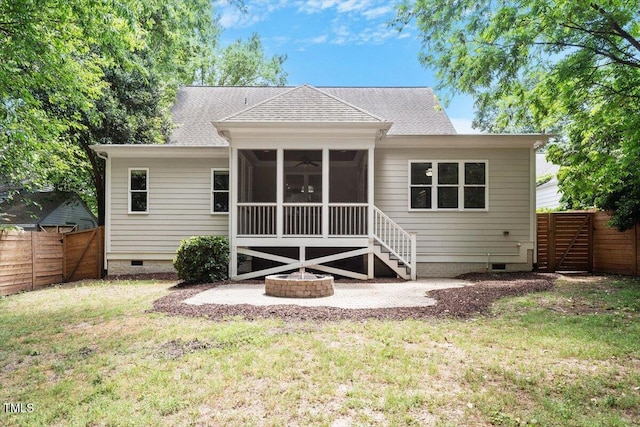 rear view of house featuring a yard, crawl space, fence, and a shingled roof
